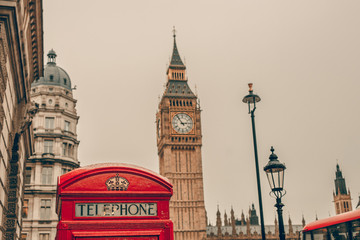Big Ben in London, England and famous red telephone cabin