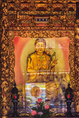 Beautiful Guanyin sculpture at Lungshan Temple of Manka,  Buddhist temple in Taipei, Taiwan. The temple was built in Taipei in 1738 by settlers from Fujian during Qing rule in honor of Guanyin.