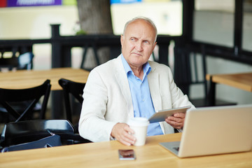 Senior Businessman Deep in Thought