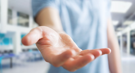 Businessman showing his empty hand