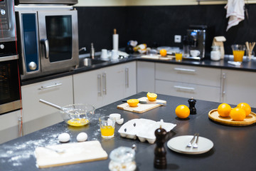Food products and kitchenware on table