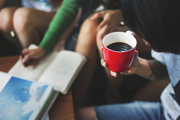 Human Hand Writing Notebook Coffee Break Concept