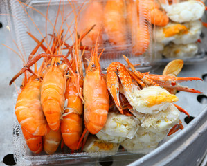 Cooked crabs and shrimps on the market of Thailand