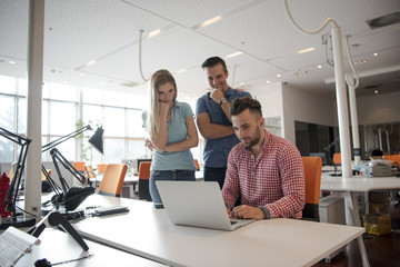 Group of young people employee workers with computer