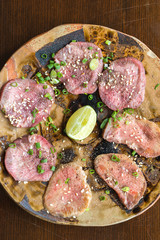 Barbecue sliced beef tongue marinated in pepper, onion, sesame oil and soy sauce.