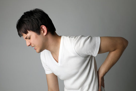 young man having a backache