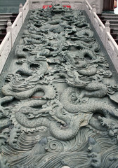 Traditional chinese dragon stone carved on displayed in chinese temple in bangkok, Thailand