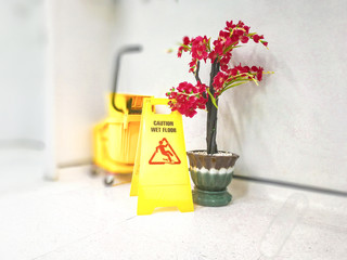 The label for caution the wet floor.