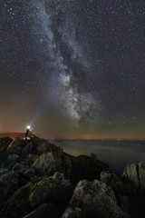 Summer sky gazing on the cliffside.