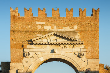 Arch of Augustus - ancient romanesque gate of the city, historical italian landmark, the most ancient roman arch that still stands intact, Rimini, Emilia-Romagna region, Italy.