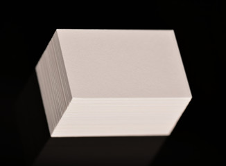 White Business Cards, flyer or banner Mockup. Blank empty template of paper cards  on black background.