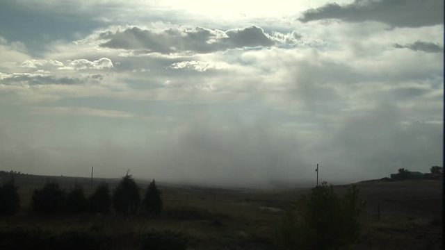 Fog Swirls Over Colorado Farms