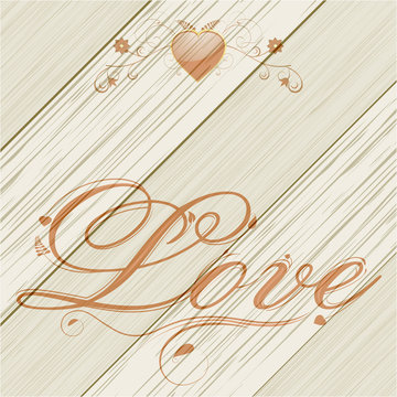 Love text and floreal heart on wood background