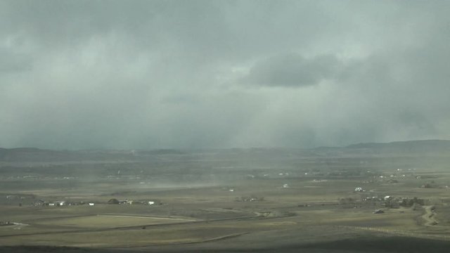 Downslope Wind Storm Lofts Clouds of Dust