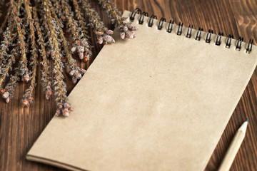 Notebook on wooden background