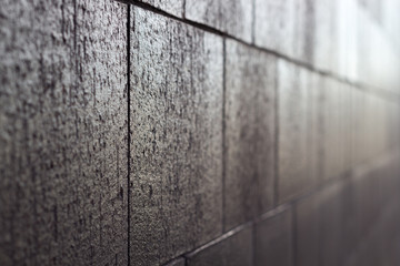 modern constructed wall with rough texture