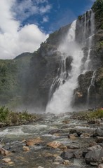 misty waterfall in the himalayas © is