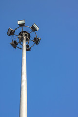 sportlights tower with blue sky background