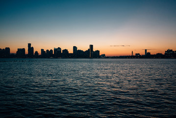 Fototapeta na wymiar Sunset view of coastal city