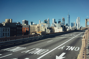 Empty road at the Brooklyn Bridge in New York