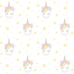 cute cartoon unicorn with stars seamless vector pattern background illustration

