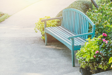 old wood bench in the green park.