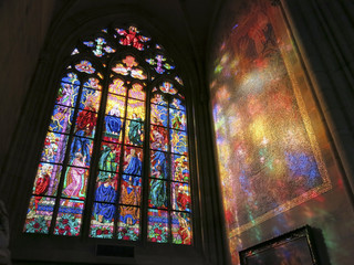 Sunlight reflecting a stained glass window