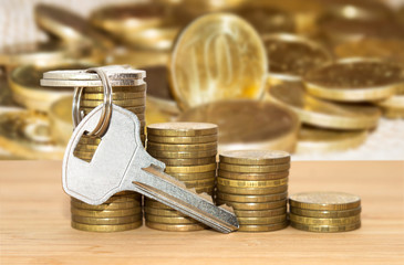 Coins stack with keys