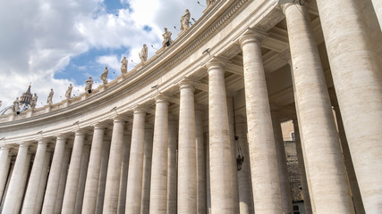 Vatican City, Vatican - February 20, 2015: The columns of  St. Peter's Square and Basilica