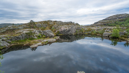 Forsand, Norway - May 28, 2016: Lake on the Preikestolen (Pulpit Rock) hike trail
