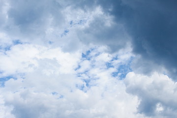 blue sky with big white cloud, and motion raincloud  in  nature