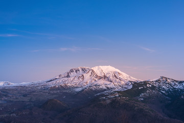Naklejka na ściany i meble scenic view of mt st Helens with snow covered in winter when sunset.