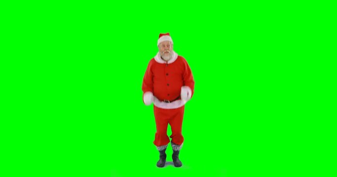 Happy santa claus dancing against green background 4k