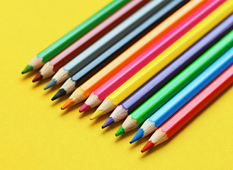 coloured pencil pastels on a colour background