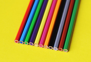 coloured pencil pastels on a colour background