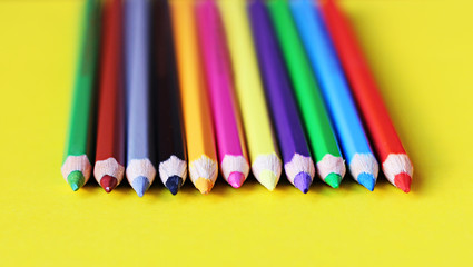 coloured pencil pastels on a colour background isolated