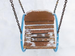 Swing in the snow. View from above