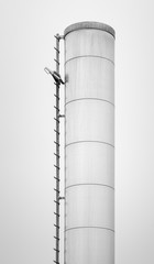 Top of an industrial chimney with ladder