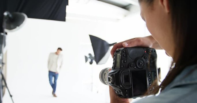 Male model posing for fashion shoot in studio 4k