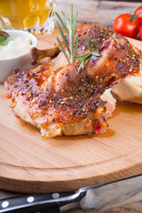 Fried chicken on wooden board