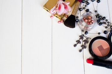 decorative cosmetics on a wooden table