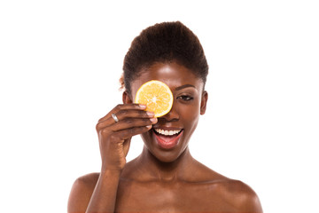 afro american woman posing with slices of lemon