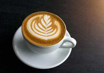 Cup of latte art Coffee in coffee shop