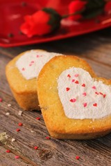 Homemade Two mini Heart cake with heart shape stencil work in the middle, selective focus