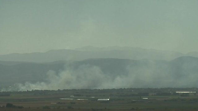 Smoke from Wildfires on Plains and in Mountains
