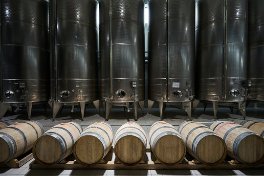 Wooden barrels and large aluminum barrels wine factory
