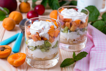 Sweet healthy fruit salad in a glass bowl