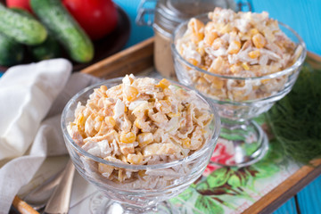 Salad with egg, chicken, corn