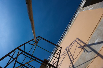 The scaffolding of bamboo lashed together with rope on the wrench.