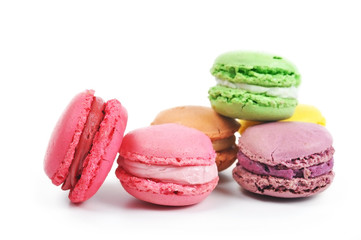 Different types of tasty and colorful macaroons isolated on the white background with copy space